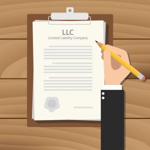 llc limited liability company illustration with hand signing a paper document