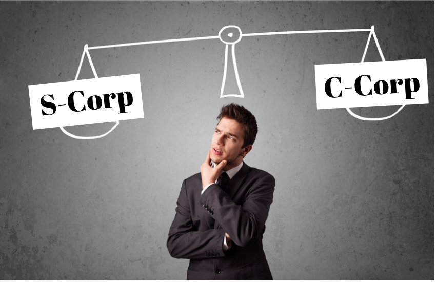 Man with S-Corp vs C-Corp Scale above head
